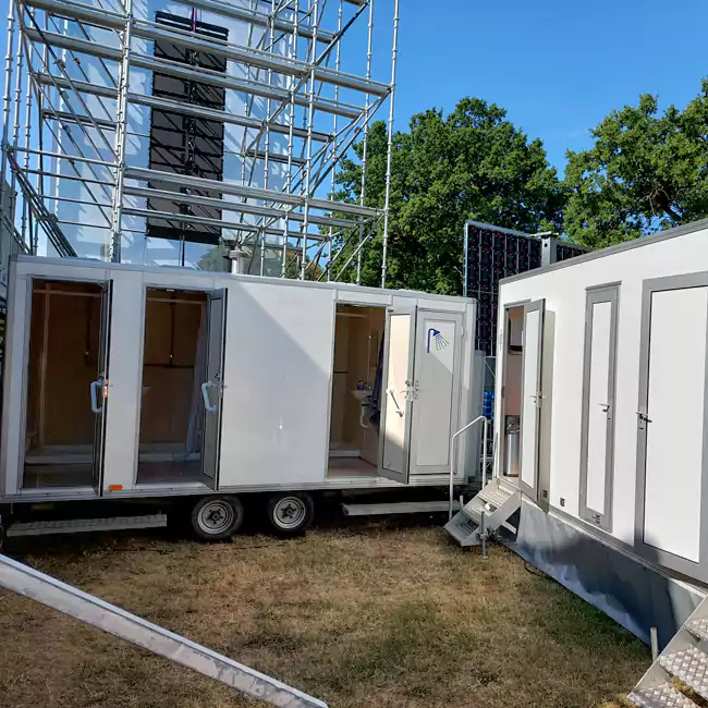 concert portable shower trailer backstage